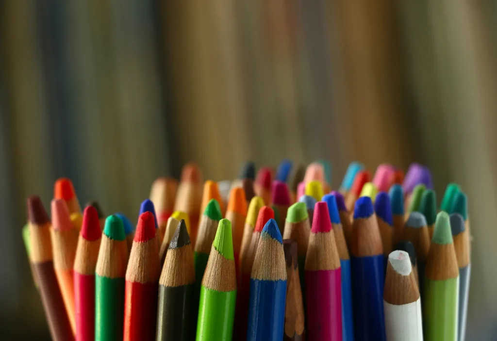 Coloured pencils grouped together in a cup