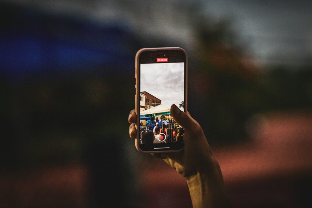 Small business owner photographing a product with a phone