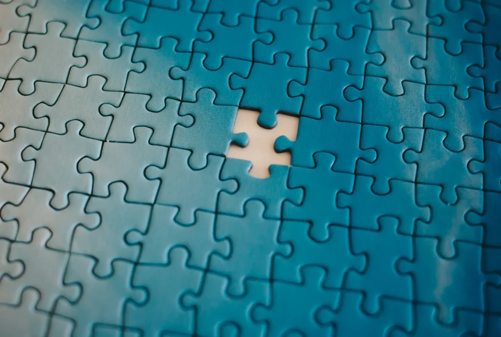 Jigsaw puzzle with one missing piece