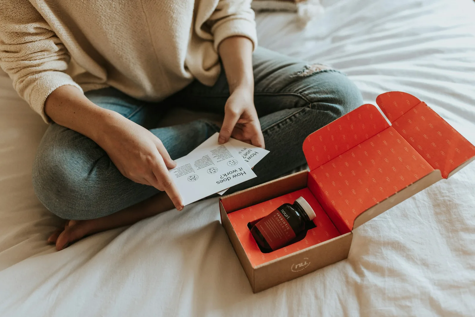 Woman unboxing a product parcel